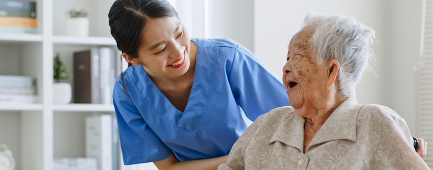 Life Assure Caregiver Assisting Happy Senior Hero